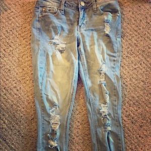 Distressed ripped jeans